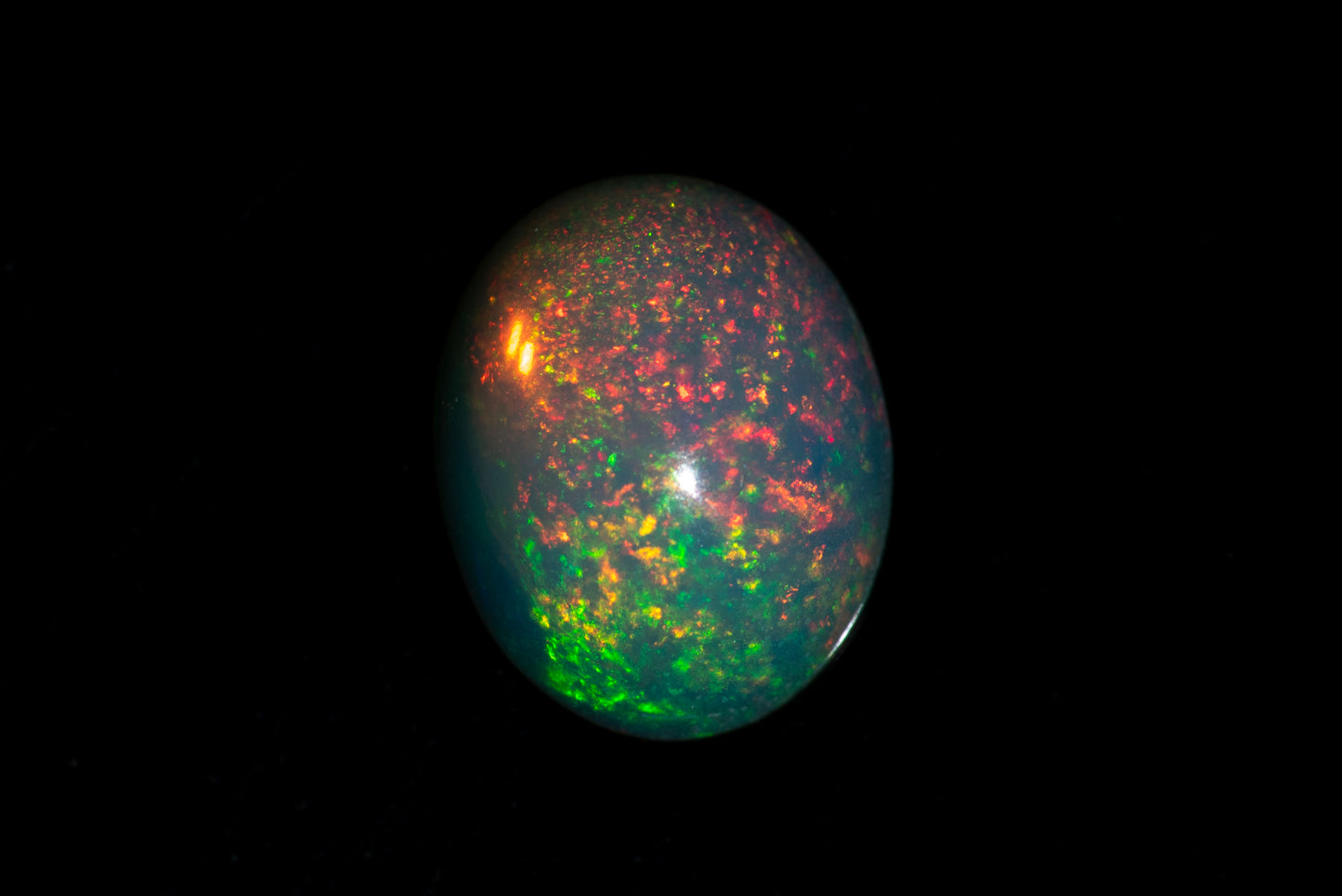 Ethiopian opal 1.05ct 9x7mm oval cabochon