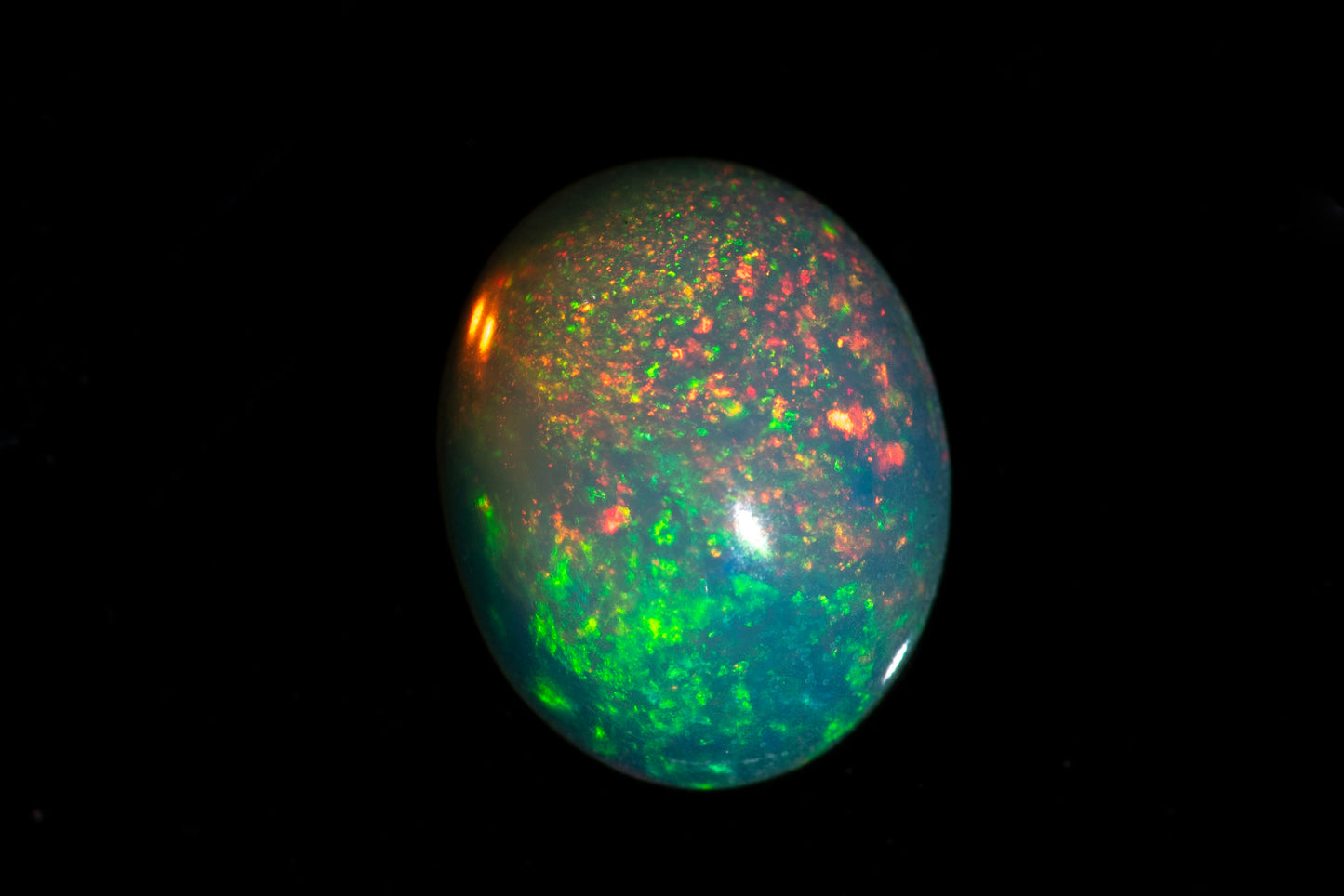 Ethiopian opal 1.05ct 9x7mm oval cabochon