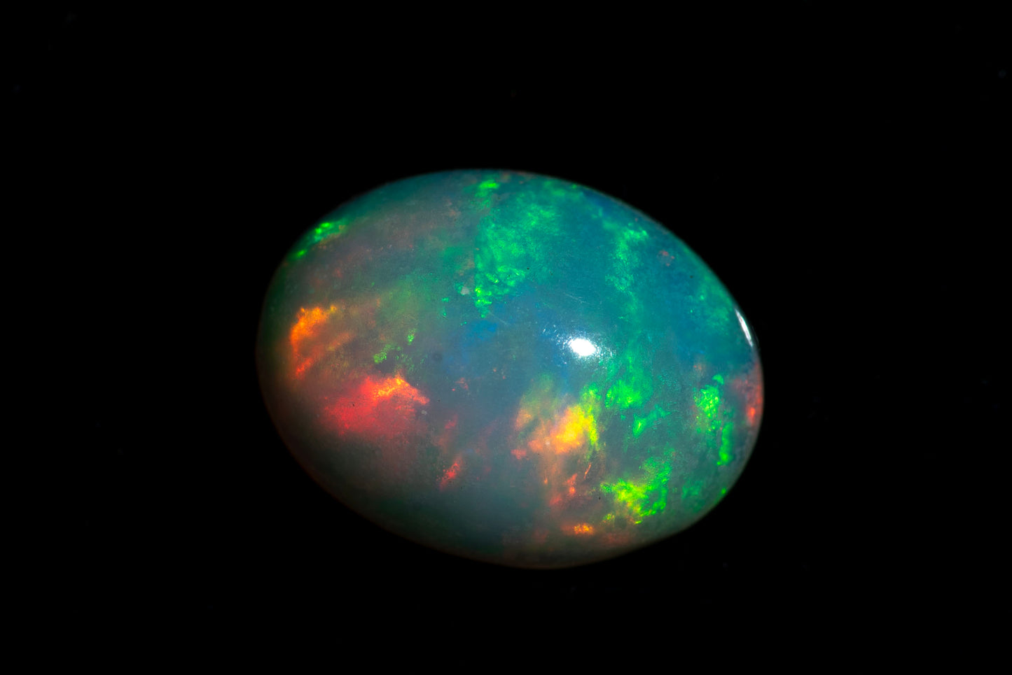 Ethiopian opal 1.02ct 9x7mm oval cabochon