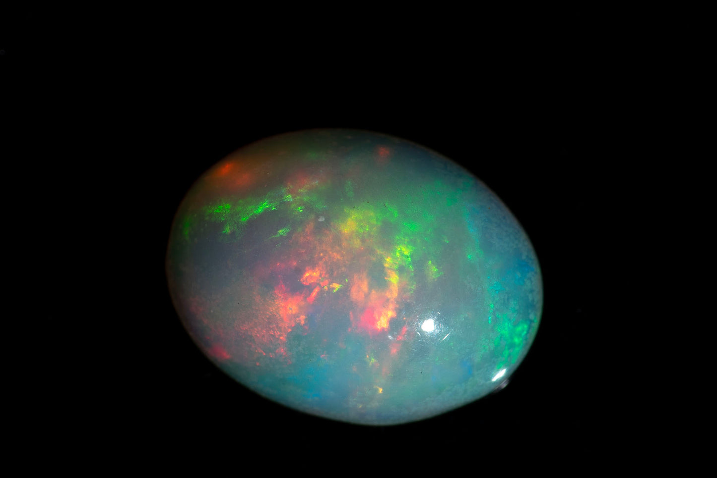 Ethiopian opal 1.02ct 9x7mm oval cabochon