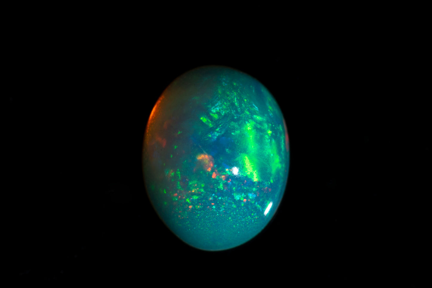 Ethiopian opal 1.28ct 9x7mm oval cabochon