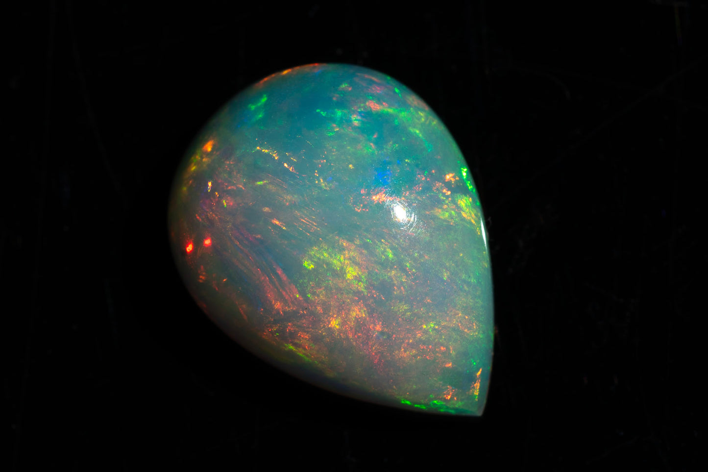 Естествен етиопски опал 2.86ct 13x9.8mm капка кабошон