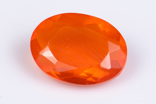Оранжев мексикански огнен опал 0.75ct VS овална шлифовка