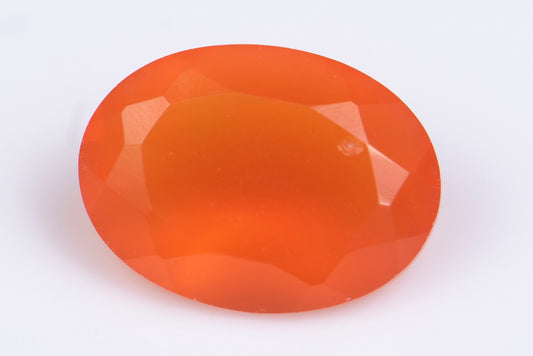 Оранжев мексикански огнен опал 0.79ct овална шлифовка