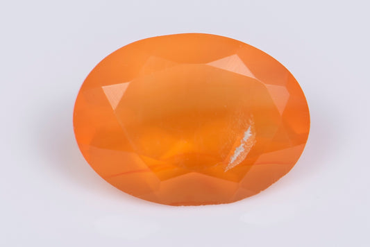 Оранжев мексикански огнен опал 1.00ct овална шлифовка