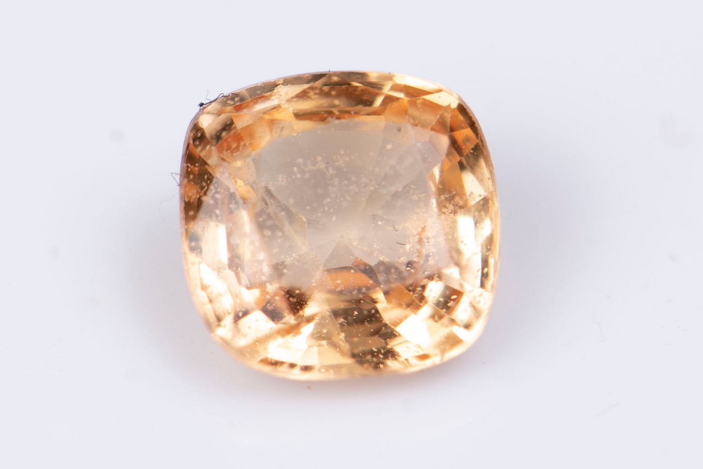 Orange sapphire 0.67ct heated cushion cut 9mm heated round cut