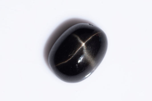 Black star diopside 2.35ct 9x7mm oval cabochon