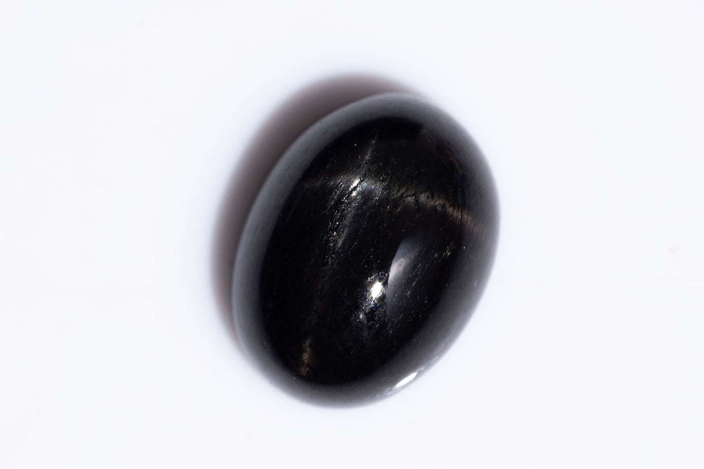 Черен звезден диопсид 2.47ct, 9x7mm овален кабошон