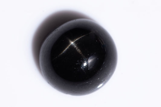 Black star diopside 4.08ct 8.9mm round cabochon