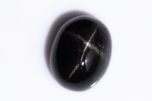 Black star diopside 2.92ct 9x7mm oval cabochon