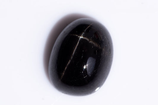 Black star diopside 2.79ct 9x7mm oval cabochon
