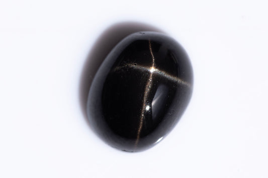 Black star diopside 2.90ct 9x7mm oval cabochon