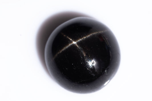 Black star diopside 4.23ct 9.1mm round cabochon