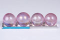 Natural pink aura quartz sphere crystal collectible