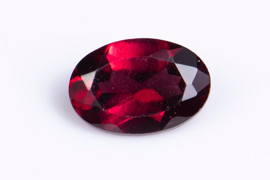 Purple rhodolite garnet 0.61ct oval cut