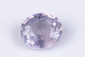Natural untreated purple sapphire 0.70ct oval cut, very pale lilac with visible inclusions