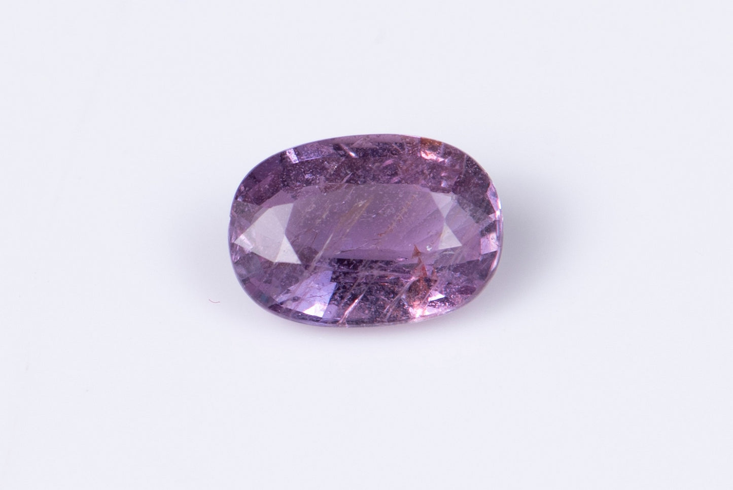 Purplish pink untreated sapphire 0.85ct oval cut