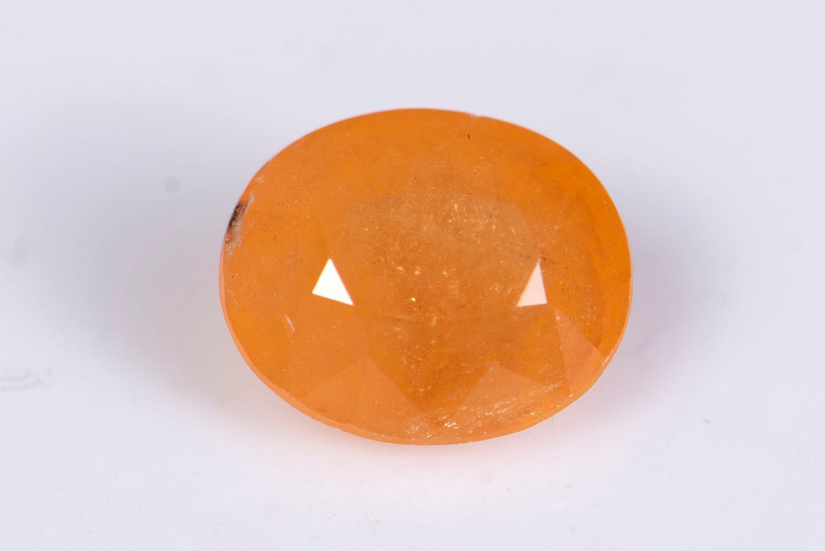 Естествен спесартин гранат 2.46ct овална шлифовка