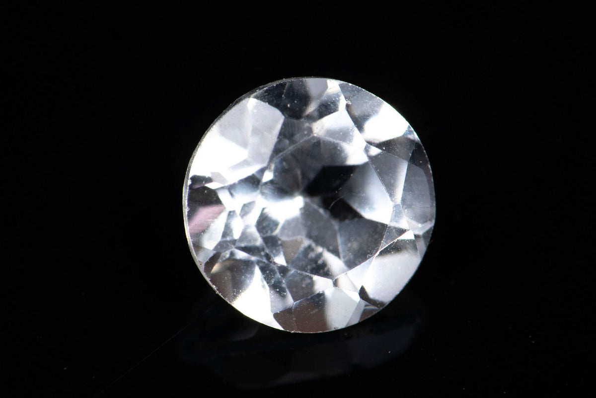 Естествен бял топаз 0.98ct 6mm кръгла шлифовка №1