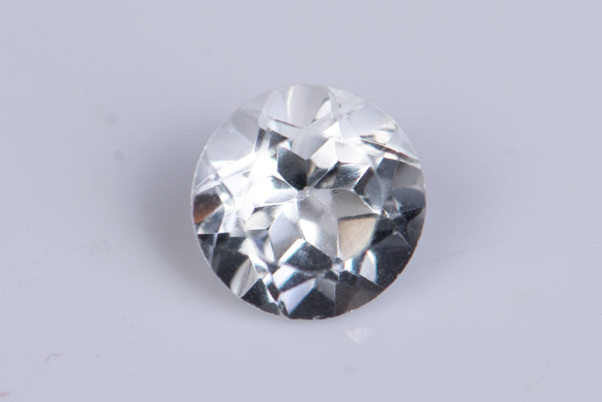 Естествен бял топаз 1.00ct 6mm VVS кръгла шлифовка
