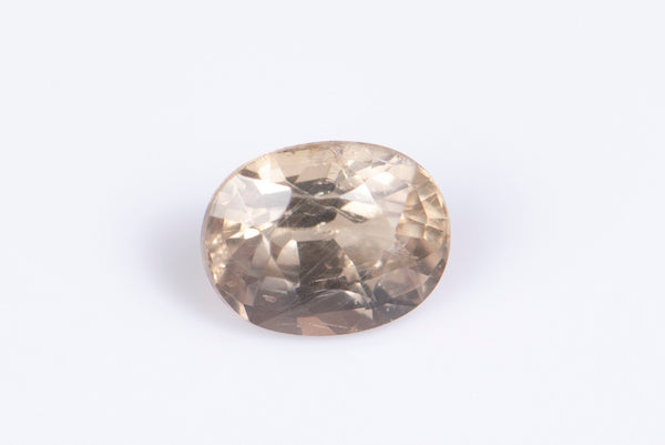 Естествен жълт сапфир 0.98ct, нетретиран, флуоресцентен, овална шлифовка